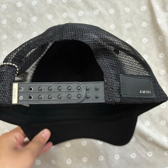 AMIRI Staggered Logo Trucker Hat In Black